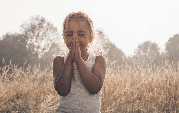 Little Girl Closed Her Eyes, Praying Outdoors, Hands Folded In P